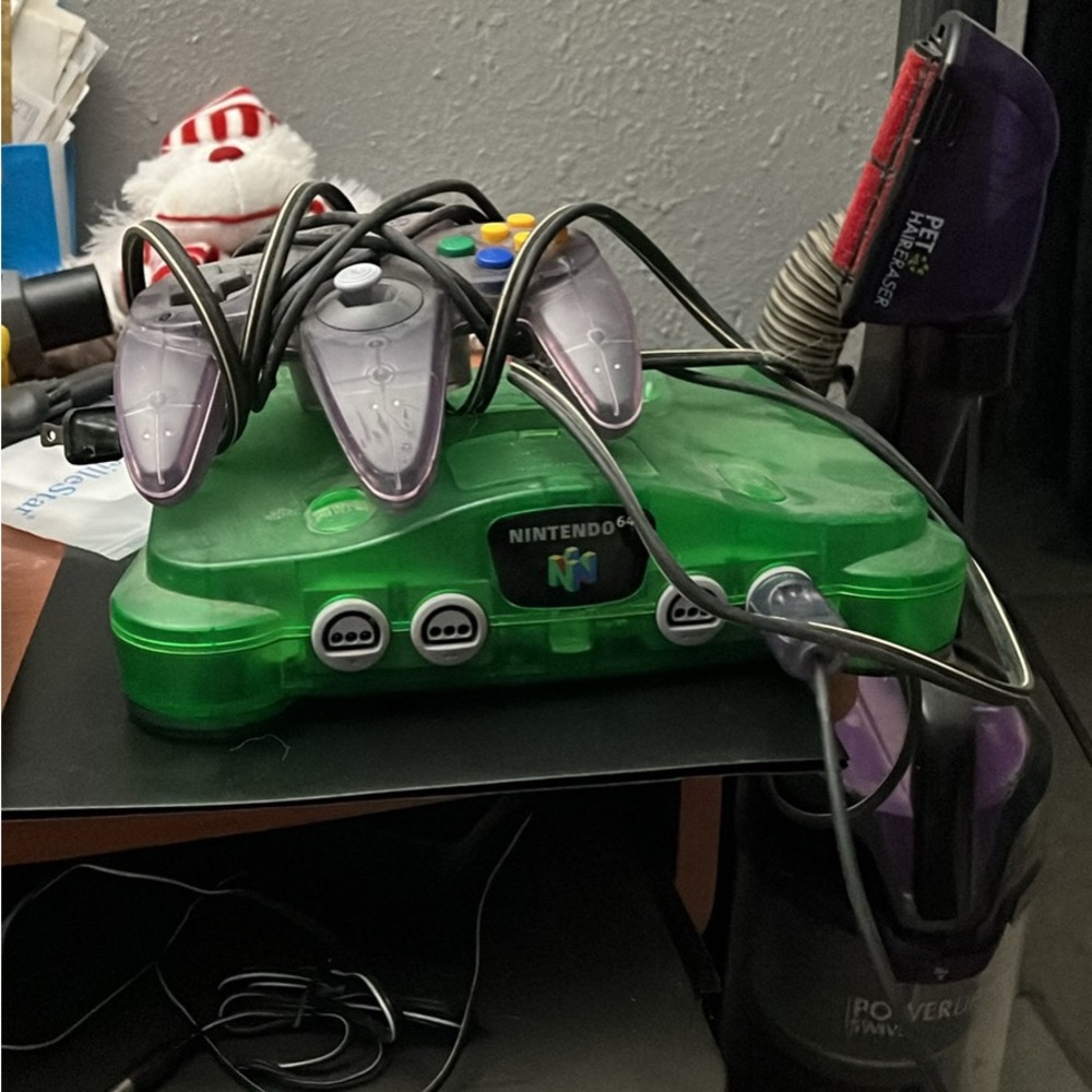 Nintendo 64 Translucent Green Console with Controllers. (SOLD)